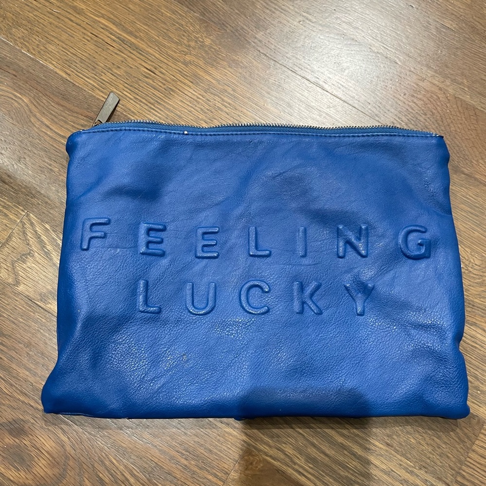 Zara Blue Clutch “Caution, Feeling Lucky״